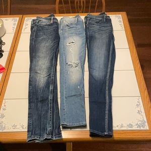 Set of three size 27 skinny jeans